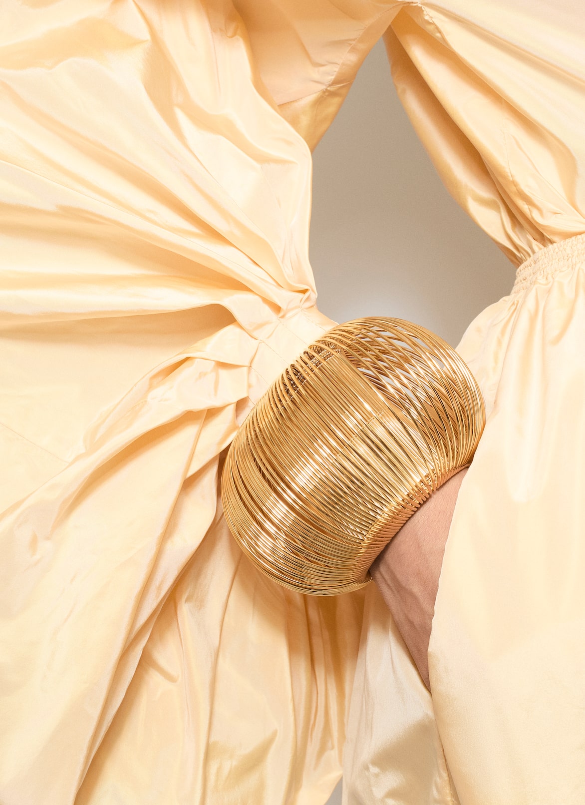 SLINKY CUFF ALAÏA GOLD SLINKY CUFF